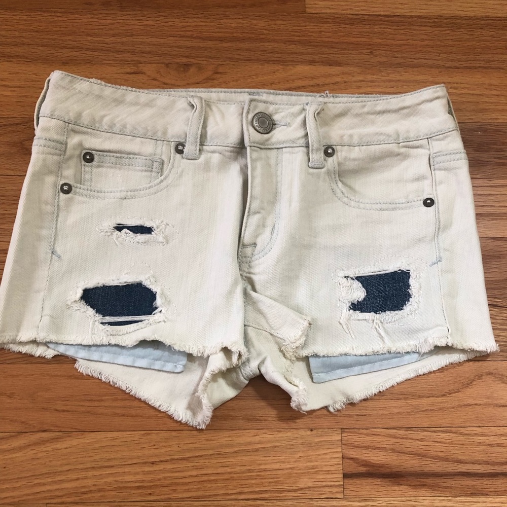 Stretch material bleached denim shorts